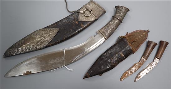 A silver mounted Kukri and two smaller blades kukri length 40cm